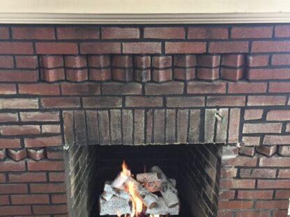 installed aspen timbers, vented, natural gas log set, into wood burning fireplace